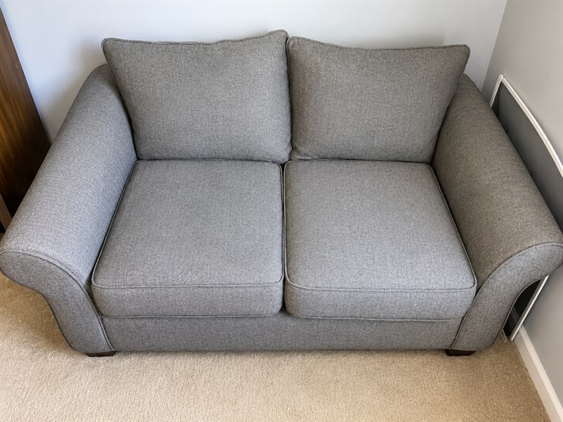 Grey loveseat after professional upholstery cleaning